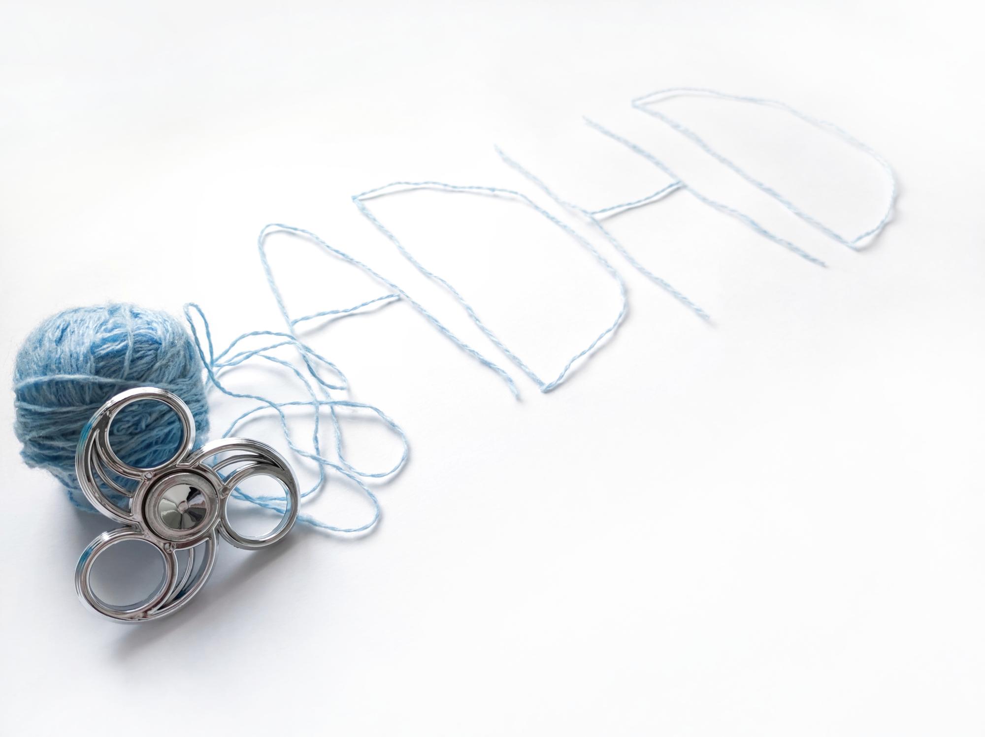 atelier table with threads, needles and sketches